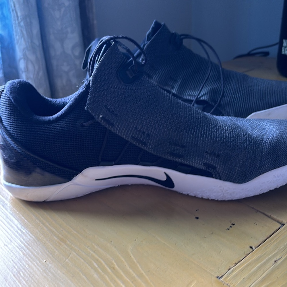 Gently used Kobe AD NXT black white sole. No box.